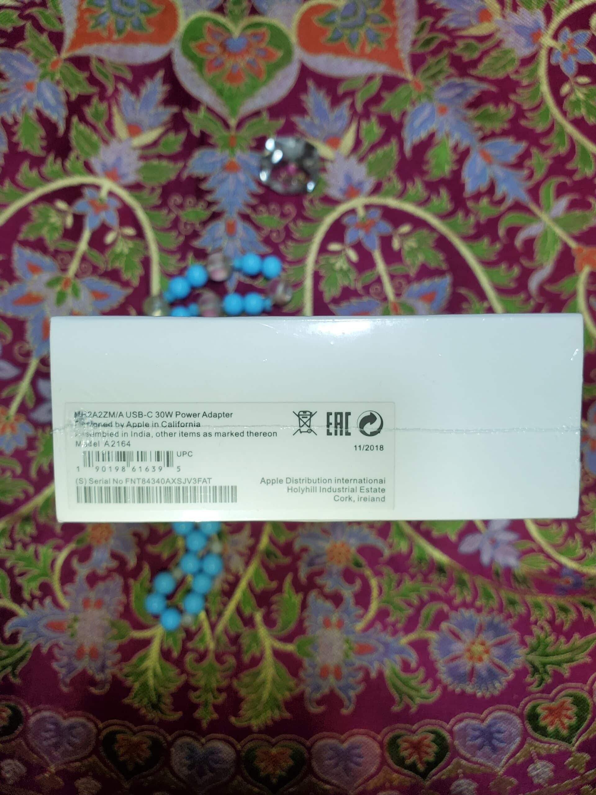 20240927_014714 30W USB-C Power Adapter - Bottom of the Macbook Air charger box