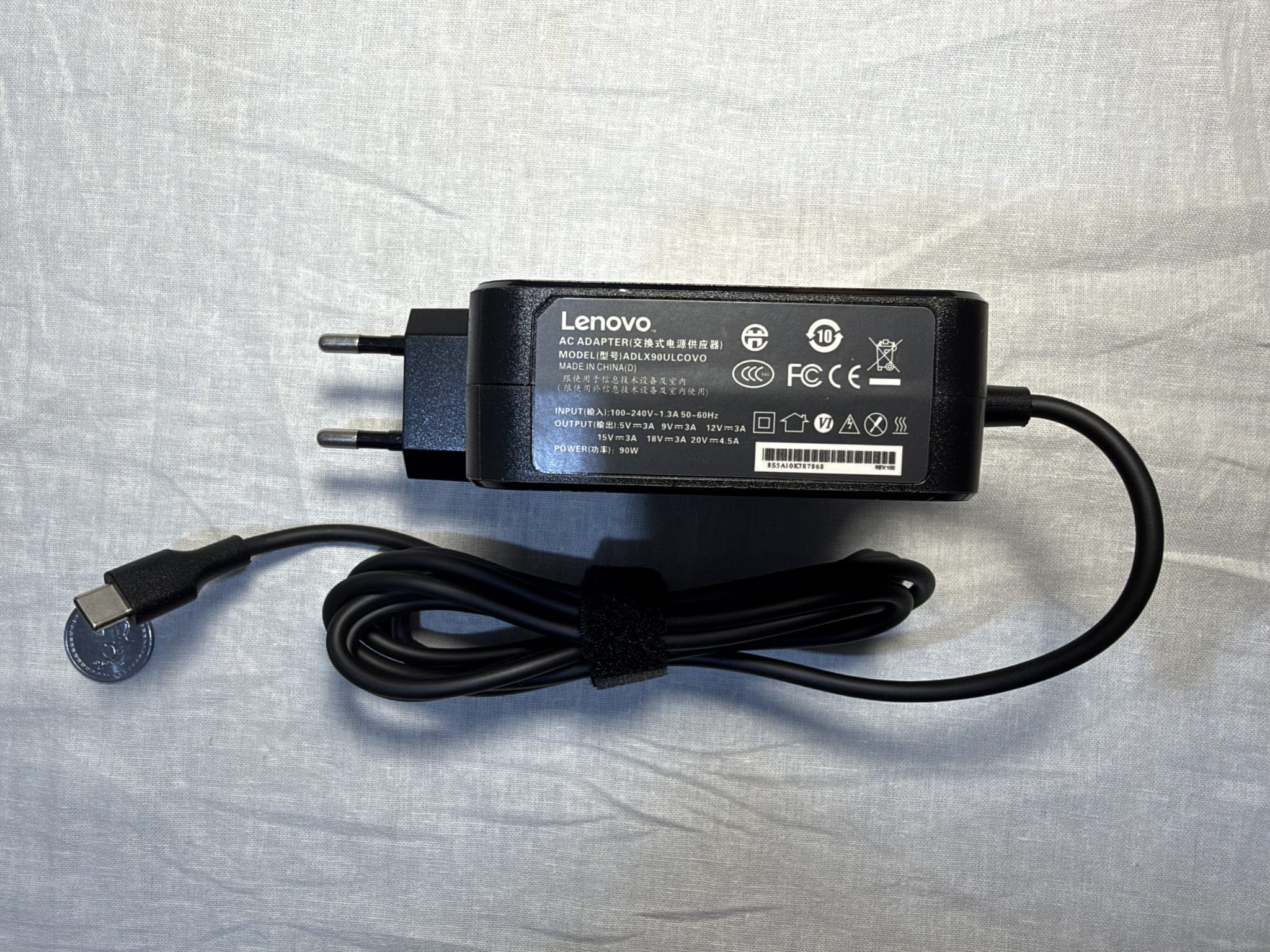 IMG_5565 Lenovo 90W USB-C (Type-C) square-shaped laptop charger – side view showing the sticker and specifications.