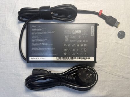 Lenovo 230W 20V - 11.5A laptop charger with a yellow rectangular connector ("Slim Tip") — front view, showing the sticker with the charger's specifications. Includes power cable. 